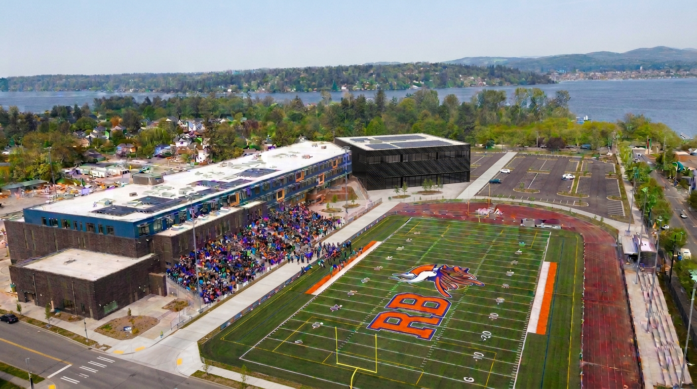 Aerial view of Rainier Beach High School and athletic field with the Viking Nation crowd in the bleachers